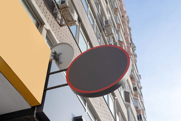 panel led redondo en exterior negro en un edificio